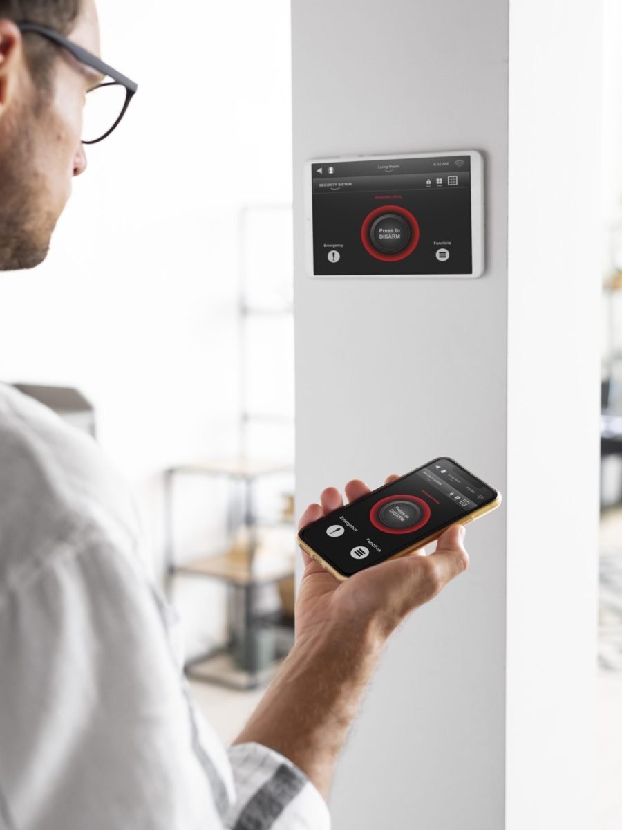 person-using-smartphone-his-automated-home